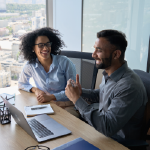 An intern and her mentor are discussing professional opportunities.